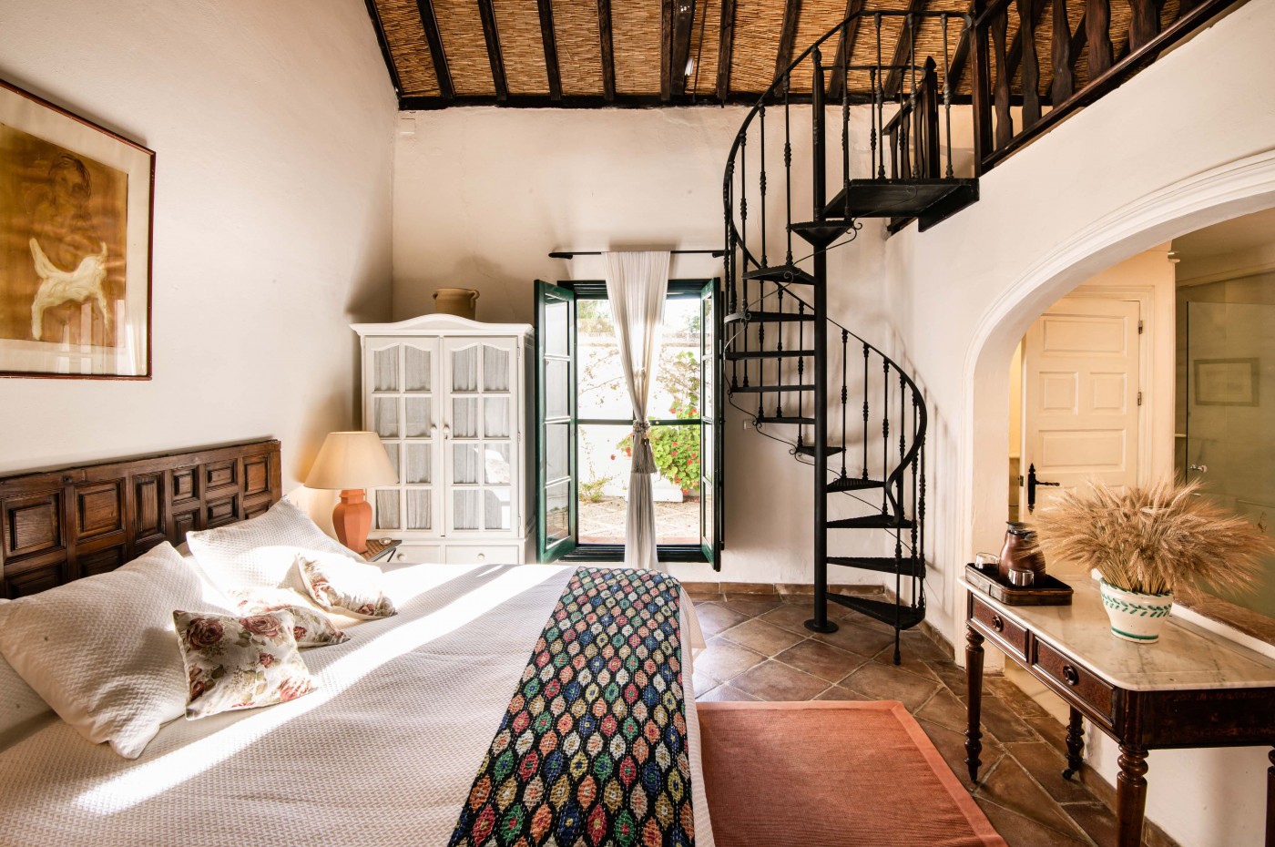 grand deluxe værelse med trappe på Hacienda de San Rafael, Las Cabezas, Andalusien